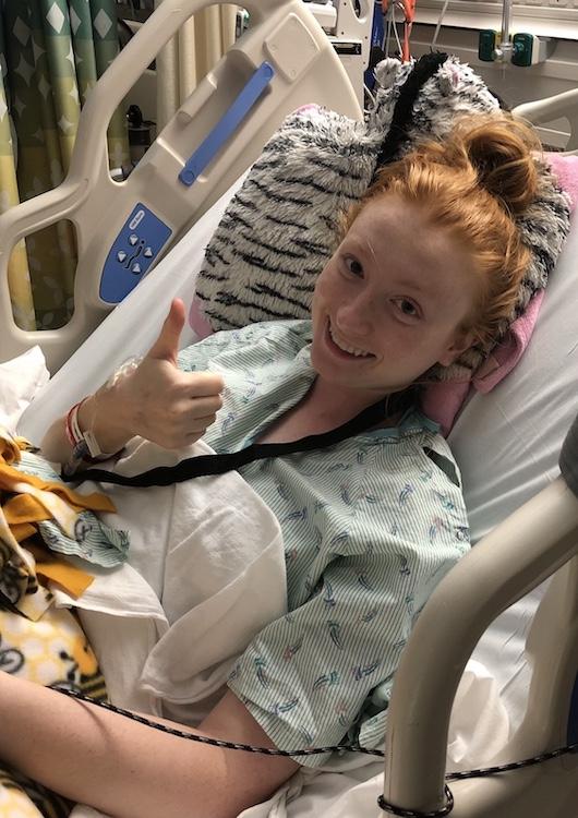 Photo courtesy of Emma Lake | Lake, a first-year Biology major, smiled before her most recent hip surgery. After the surgery, Lake used crutches to assist her for a total of 114 days.