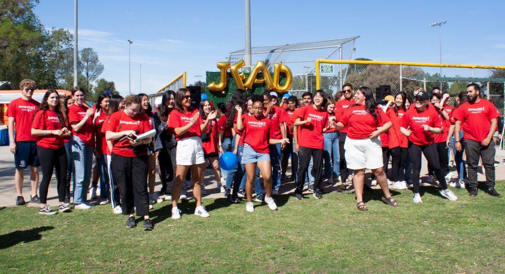 Jumpstart team members loosen up before the start of the event by doing a celebratory dance. The Jumpstart team members continued to exude this cheerful energy while interacting with the children.