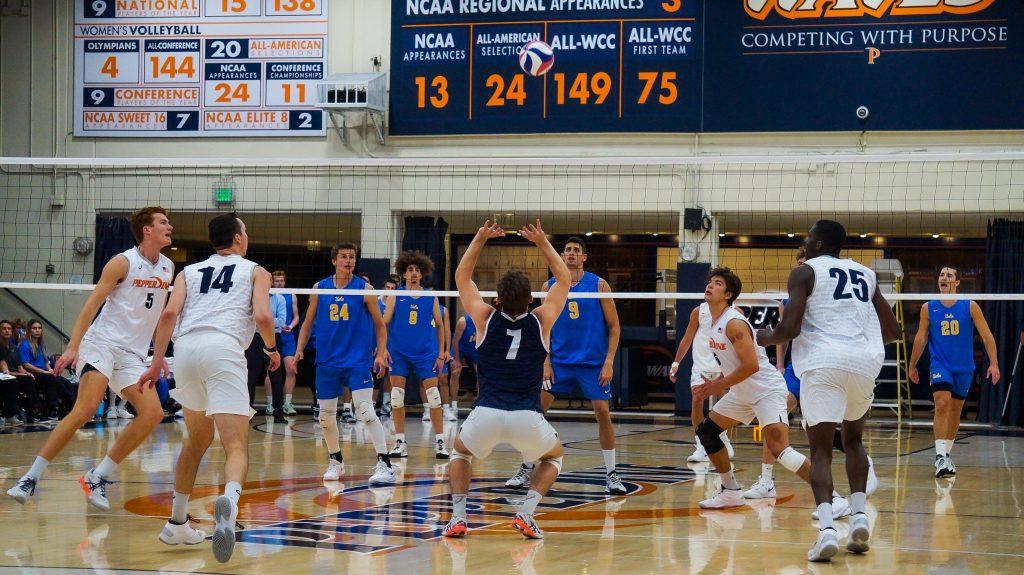 Graduate student libero Spencer Wickens sets up an open teammate versus UCLA on April 7. Wickens switched from outside hitter to libero in the middle of the season.