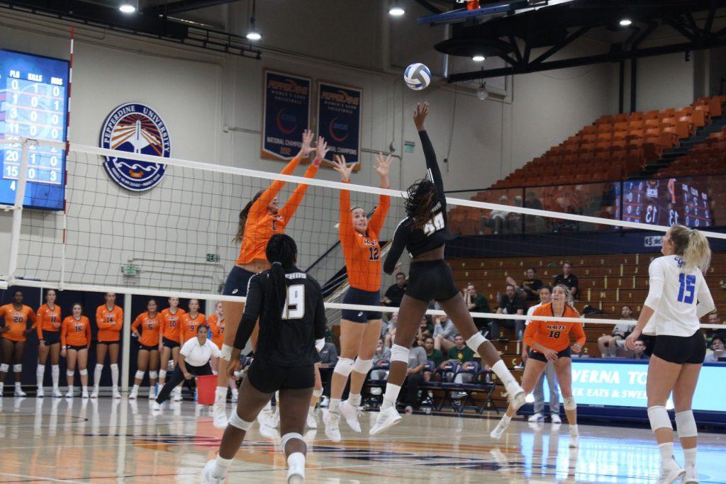 Junior middle blocker Meg Brown and Chillingworth team up for a block versus UC Santa Barbara. Brown and freshman outside hitter Emily Hellmuth led the way with 11 and 12 kills respectively.