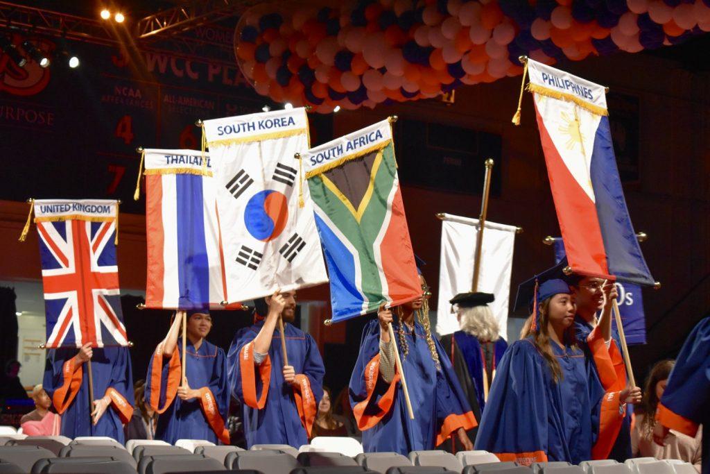 interantional students walk out representing their country