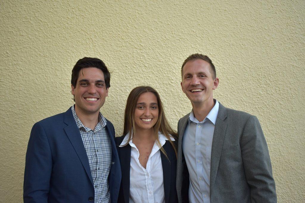 Seth Bamburg, Hope Dease and Cameron McCollum from the Global Institute smile together outside Smothers Theatre after the showing. The three worked together with a team to host the showing for the Pepperdine community. Photo by Mary Elisabeth