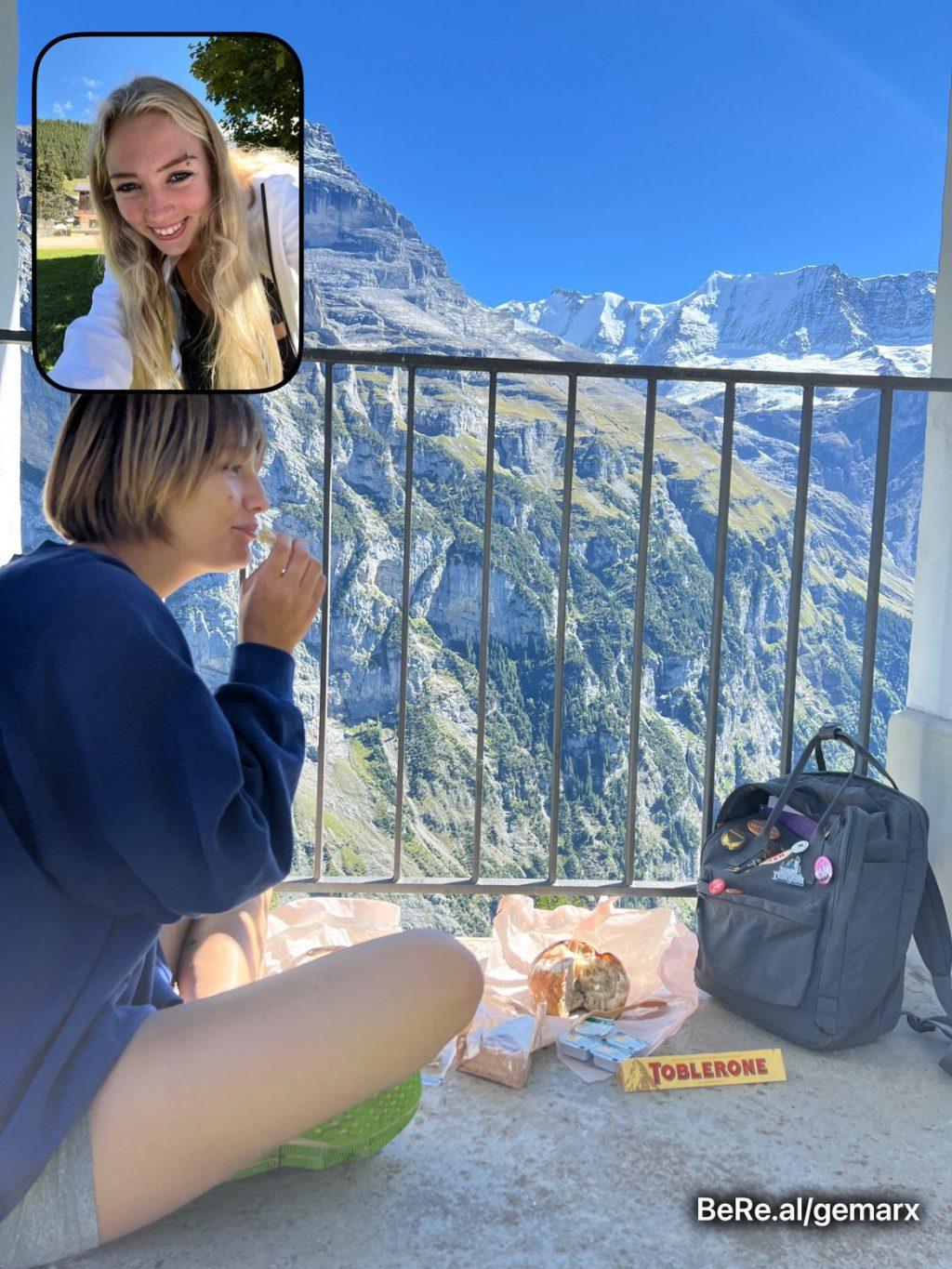 Grace Marx captured the mountains of Lauterbrunnen, Switzerland in her BeReal. The two friends enjoyed their view and some snacks. Photo courtesy of Grace Marx