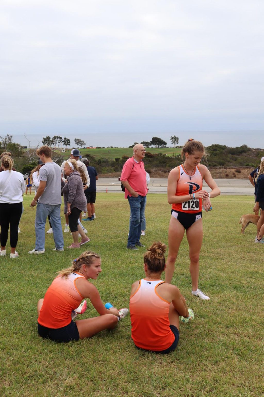 Members of the women's cross country team cool down at the Waves Invitational. LaCamera and Mittlesdorf both lead the way as sophomores.