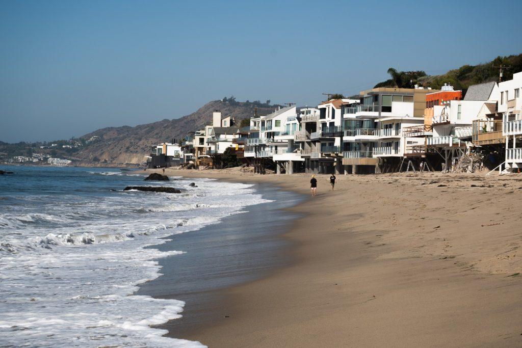 People walk on Ralphs beach in October. The beach's use as a recreational area is one reason it is important to save the coast, and slow coastal erosion, Martin said.