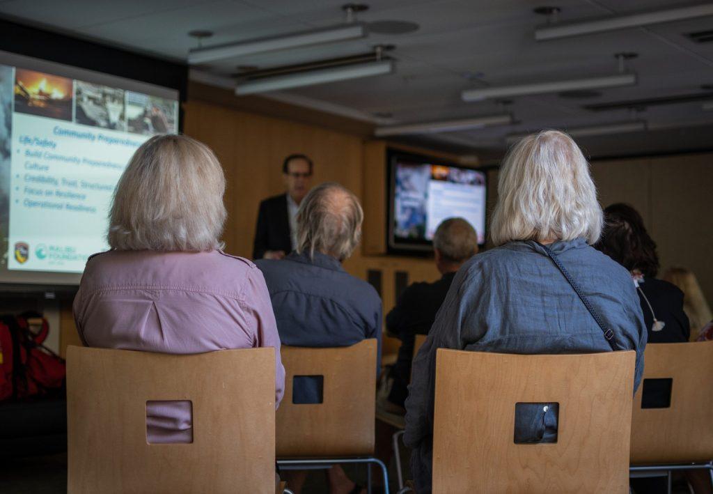 Brent Woodworth, CEO of the Los Angeles Emergency Preparedness Foundation, presents emergency preparedness resources and tips to older adults at the Malibu Senior Center on Sept. 28. People over the age of 65 disproportionately experienced negative effects of climate change, according to the Malibu Foundation's 2022 report. Photo by Lucian Himes