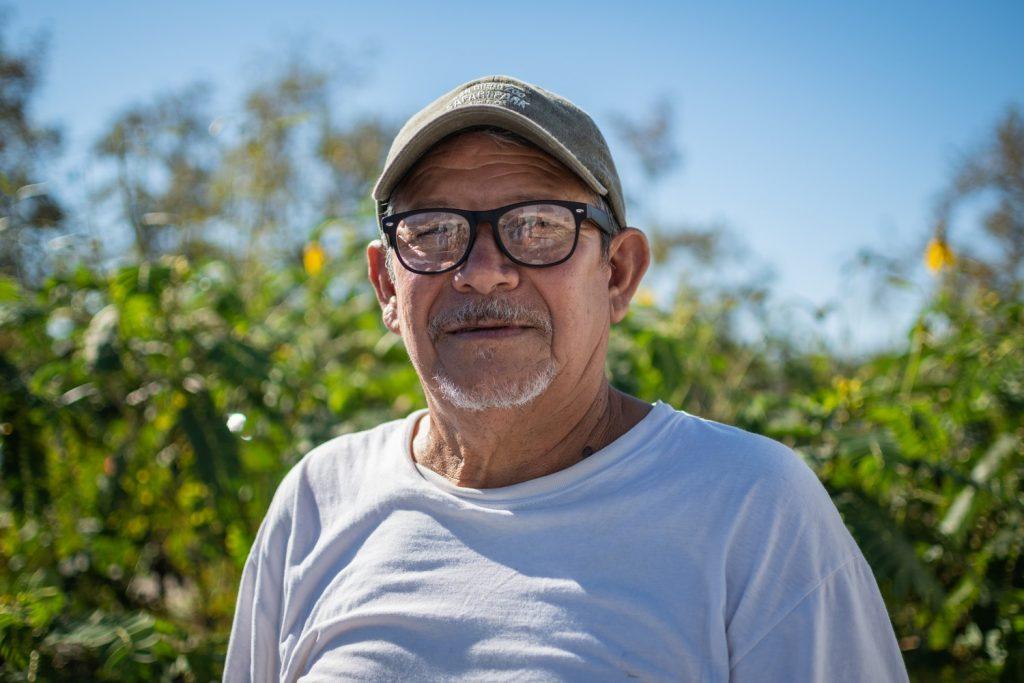 Pedro Marin, a day laborer, smiles at the Spanish language emergency preparedness training event at the parking lot by the Malibu Community Labor Exchange center Sept. 24. In collaboration with the City of Malibu, the Malibu Foundation and Pepperdine Hispanic Studies professors and students, the MLCE hosted the event for Spanish speaking day laborers and their families to strengthen the community's climate resilience. Photos by Lucian Himes