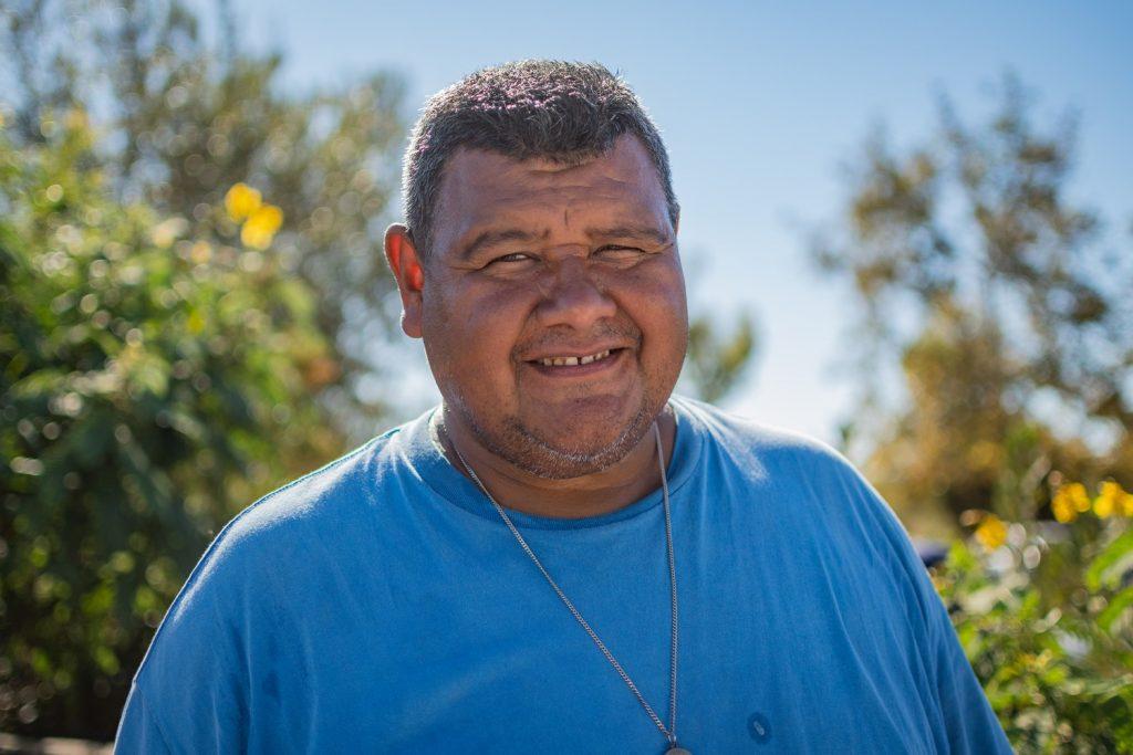 Sebastian Hernandez smiles at the Spanish-language emergency preparedness meeting Sept. 24, outside of the Malibu Community Labor Exchange Center. Hernandez said he came to the meeting to be more prepared and learn how to help others in the case of an emergency. Photo by Lucian Himes