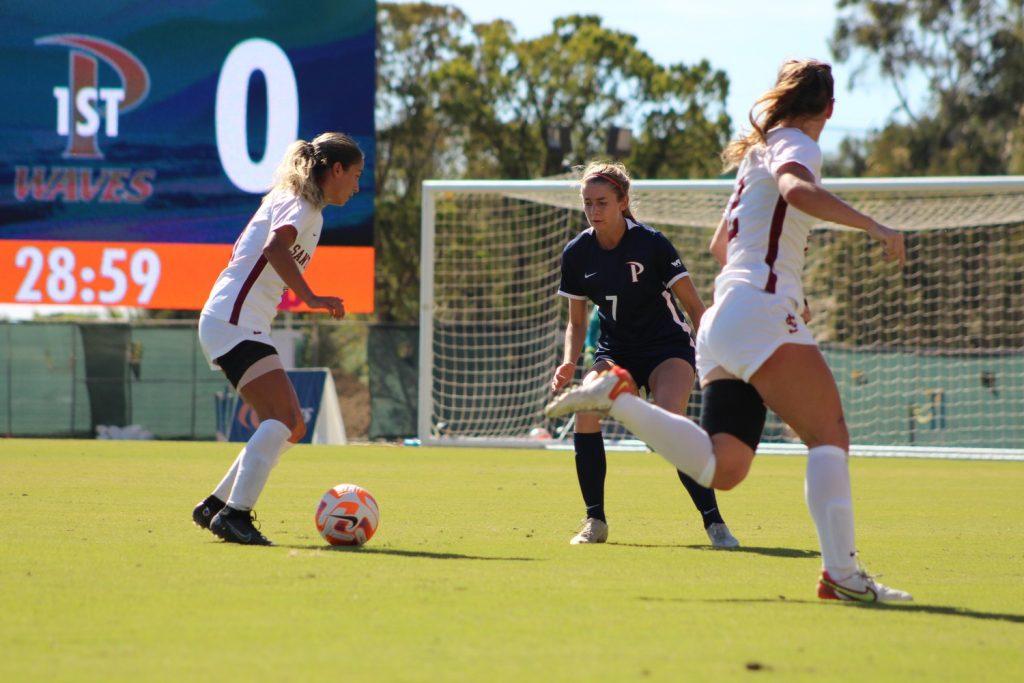 Junior defender Victoria Romero looks to defend versus the Santa Clara Broncos at Tari Frahm Rokus Field on Oct. 5. The Waves await their next opponent in the post-season.