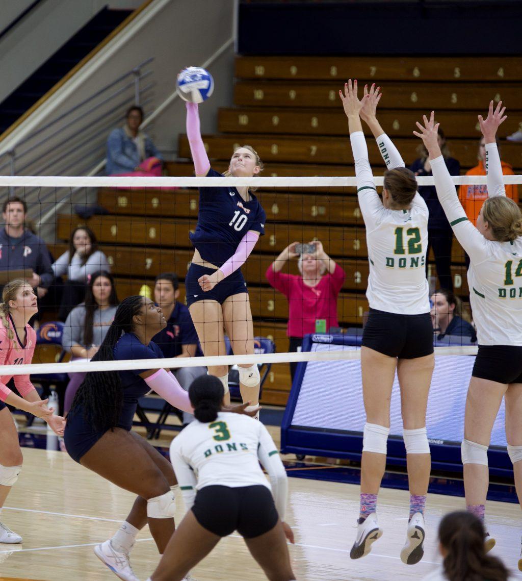 Freshman outside hitter Emily Hellmuth goes up for a kill versus the Dons on Oct. 29 at Firestone Fieldhouse. Hellmuth led the way for the Waves with 17 kills.