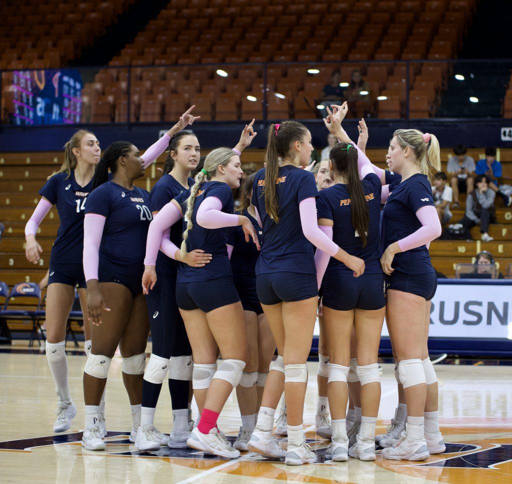 The Waves gather at mid-court versus USF on Oct. 29 at Firestone Fieldhouse. The Waves have yet to gain a winning streak since the Oct. 14 loss to Loyola Marymount.