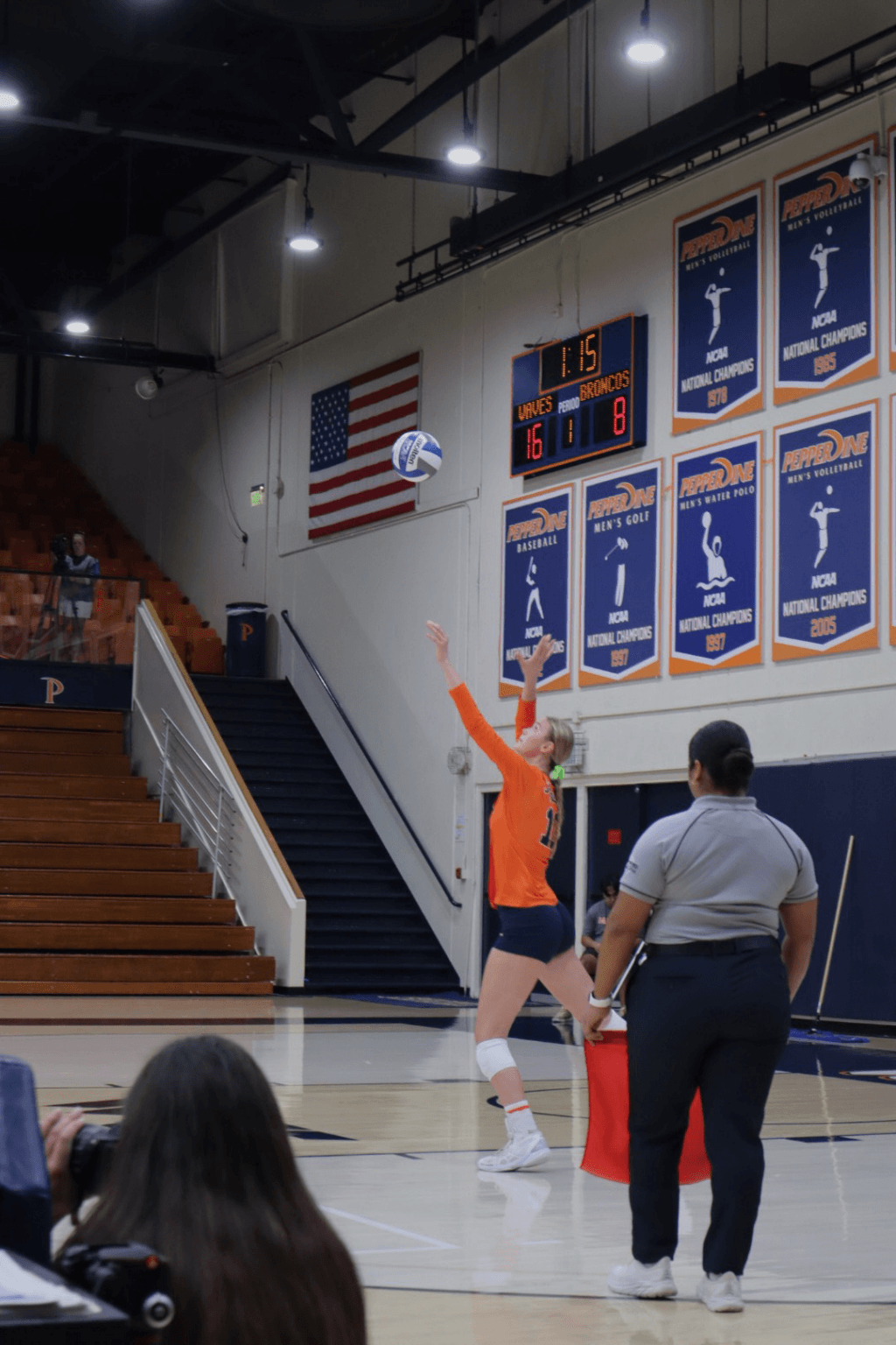 Emily Hellmuth serves in for Pepperdine Oct. 8 in Firestone Fieldhouse. Hellmuth finished the game with 5 kills and one block assist. Photo by Caitlyn Garcia