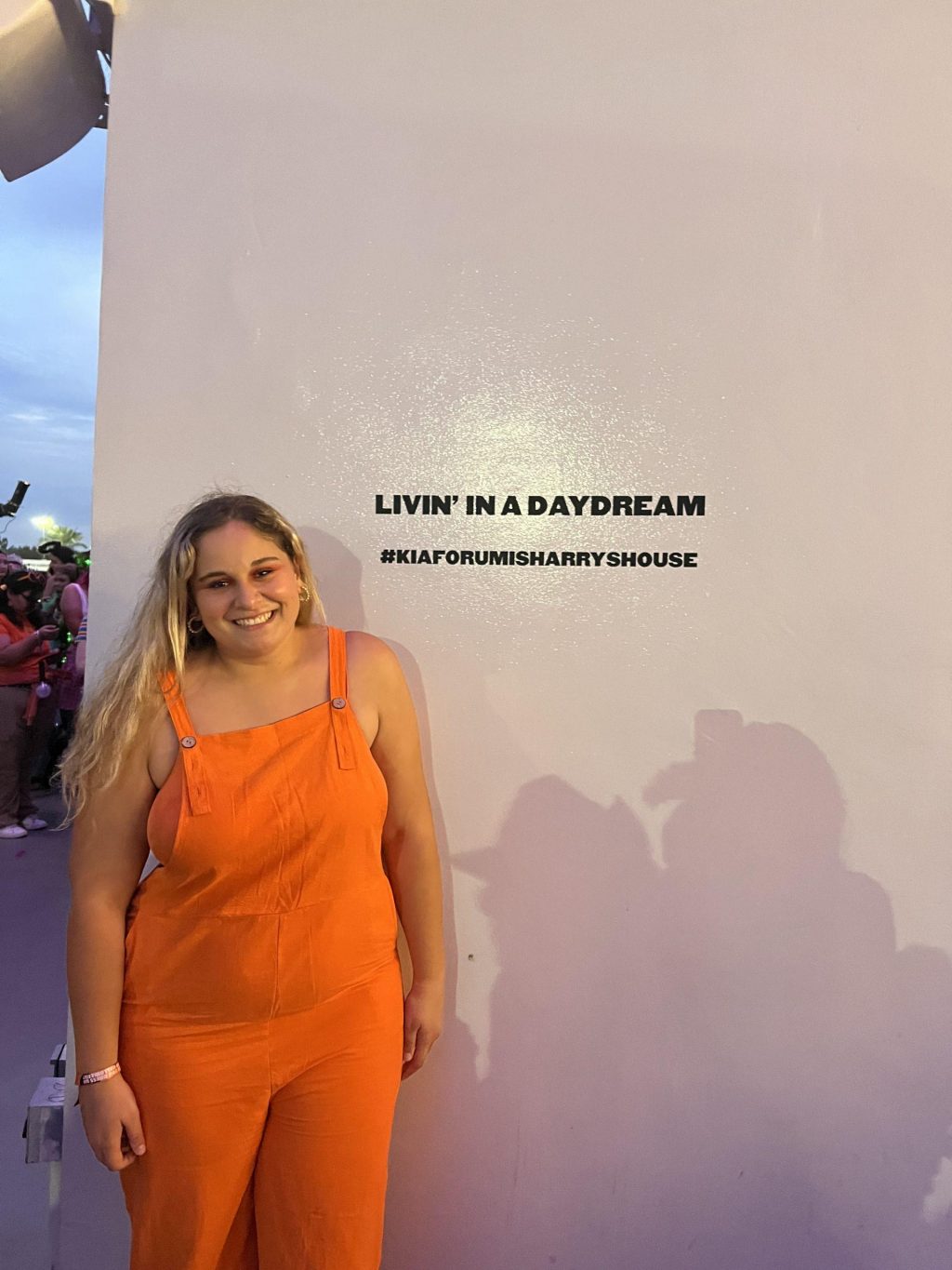 Senior Gina Duhovic smiles under the lights at "Harryween" at the Kia Forum on Oct. 31. Duhovic said her favorite Styles songs are "Daydreaming" and "Satellite." Photo courtesy of Gina Duhovic