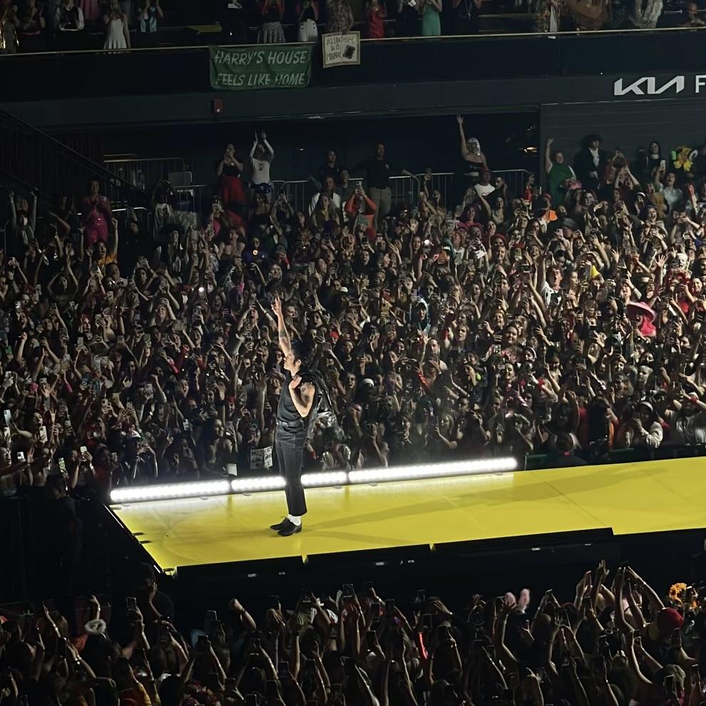 Styles waves to the crowd during "Harryween" on Oct. 31. Gonzalez attended "Harryween" and has followed Styles&squot; career since the early days of One Direction. Photo courtesy of Priscilla Gonzales