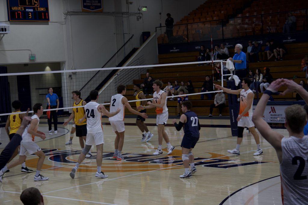 Pepperdine Men's Volleyball celebrates after a score versus Emmanuel at Firestone Fieldhouse on Jan. 14. The Waves had a hitting percentage of .539 in the effort.