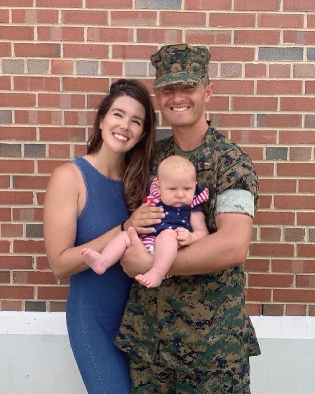 Aston at his Officer Candidate School Graduation in the Summer of 2022. Alongside him, his wife, Jordan Lee, and his youngest son, Psalms.