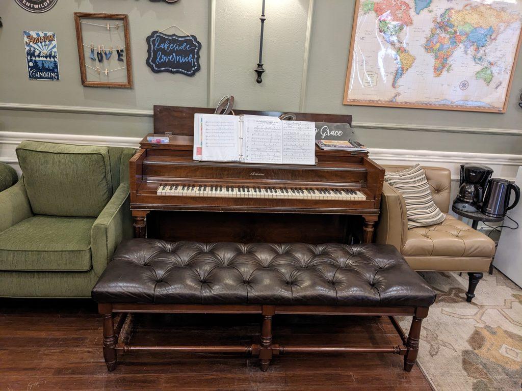 The Piano in the Lovernich common room patiently waits for someone to start playing. Aubrey leaves her sheet music on the stand so that others can have the joy of playing it too.