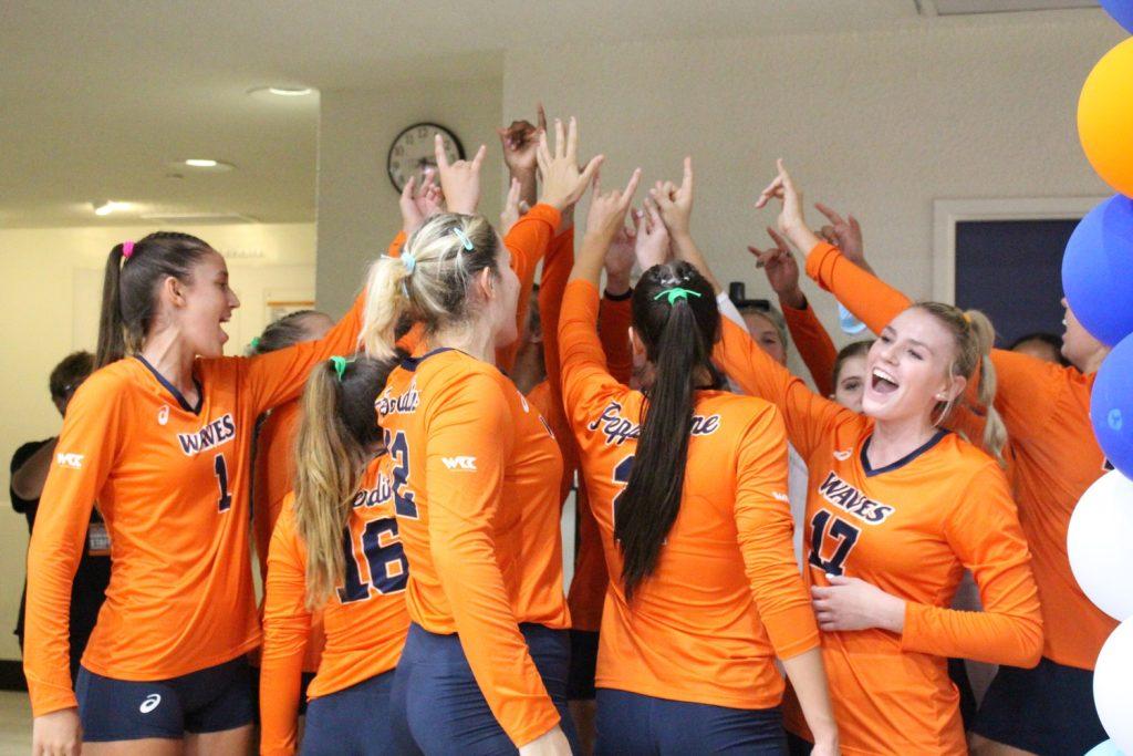 Pepperdine Women’s Indoor Volleyball team prepares for the Pepperdine ASICS Classic on Sept. 1-3, at Firestone Fieldhouse. Throughout Wong’s tenure at Pepperdine, the Waves have made the NCAA tournament four times, going as far as the second round in 2018 and 2020, according to Pepperdine Athletics. Photo by Chloe Chan