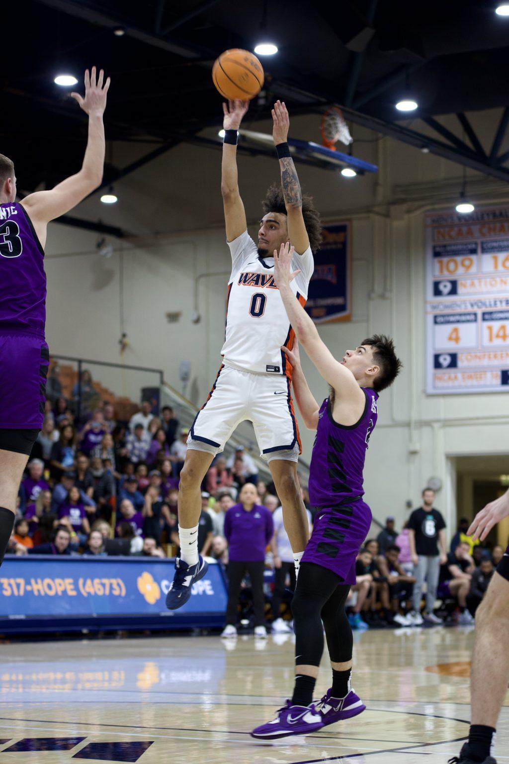 Sophomore guard Houston Mallette pulls up for mid-range over Portland defenders Feb. 4, at Firestone Fieldhouse. Mallette logged 46 of 50 minutes and finished with 25 points.