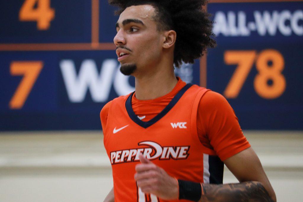 Pepperdine Men's Basketball sophomore guard Houston Mallette runs on the court versus BYU on Feb. 9, at Firestone Fieldhouse. Mallette finished with 22 points in the contest.