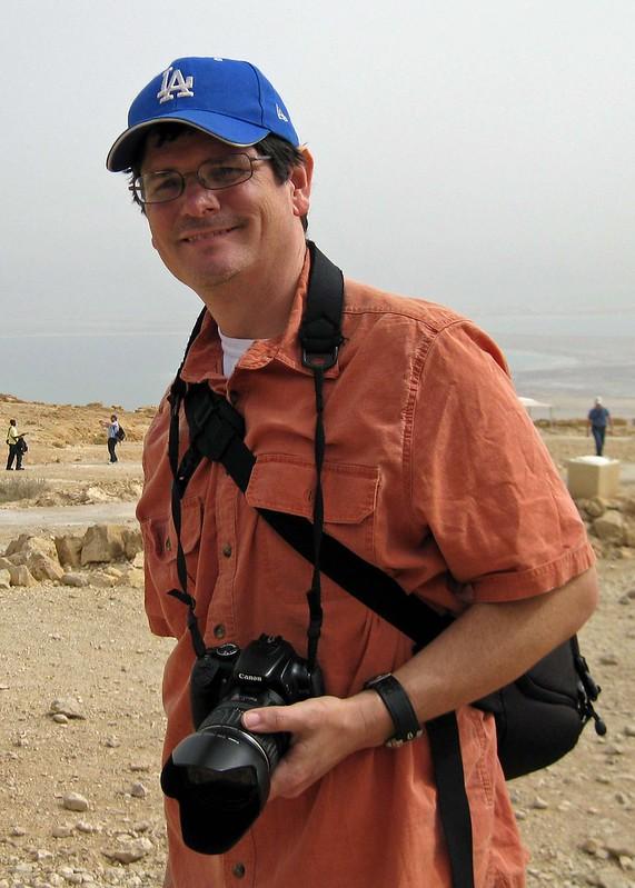 Cox holds a camera in Israel during the Florence spring 2010 Educational Field Trip. Cox said he hopes IP continues to be a major draw for Seaver College students.