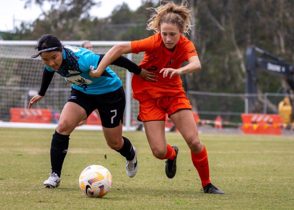 Junior midfielder Tori Waldeck struggles for the ball. The Waves would lose 4-1 against a talented Japanese All-Star team, with Waldeck scoring the lone goal.