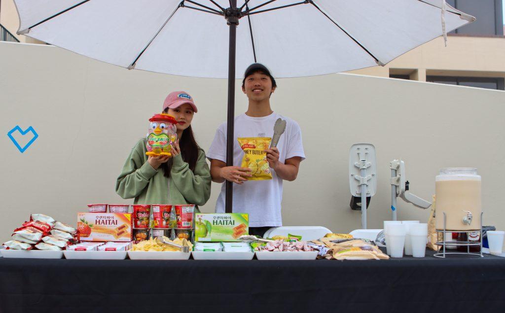 Members of the Korean Student Association pose with Korean snacks and candy at the Global Fest Night Market on March 11. The Korean Student Association celebrates Korean students and culture among the Pepperdine Community, according to their Facebook page.
