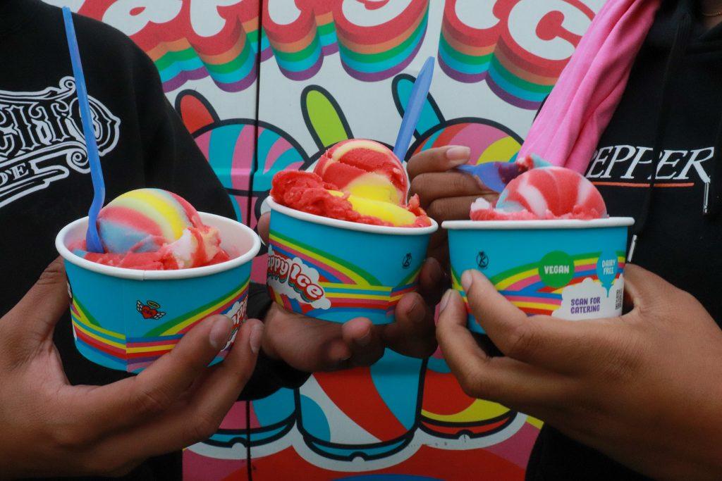 Breah Forrester and Joshua Bravo display some of Happy Ice's yummy flavors served at SWAB's Recess. Photo by Denver Patterson.