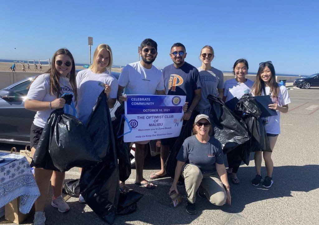 Members of PAC pose for a group photo with the Optimist Club of Malibu, helping keep Malibu Beaches clean Oct. 16, 2021. PAC members said they joined PAC to liaise with the wider Pepperdine and Malibu communities. Photo courtesy of Sahej Bhasin