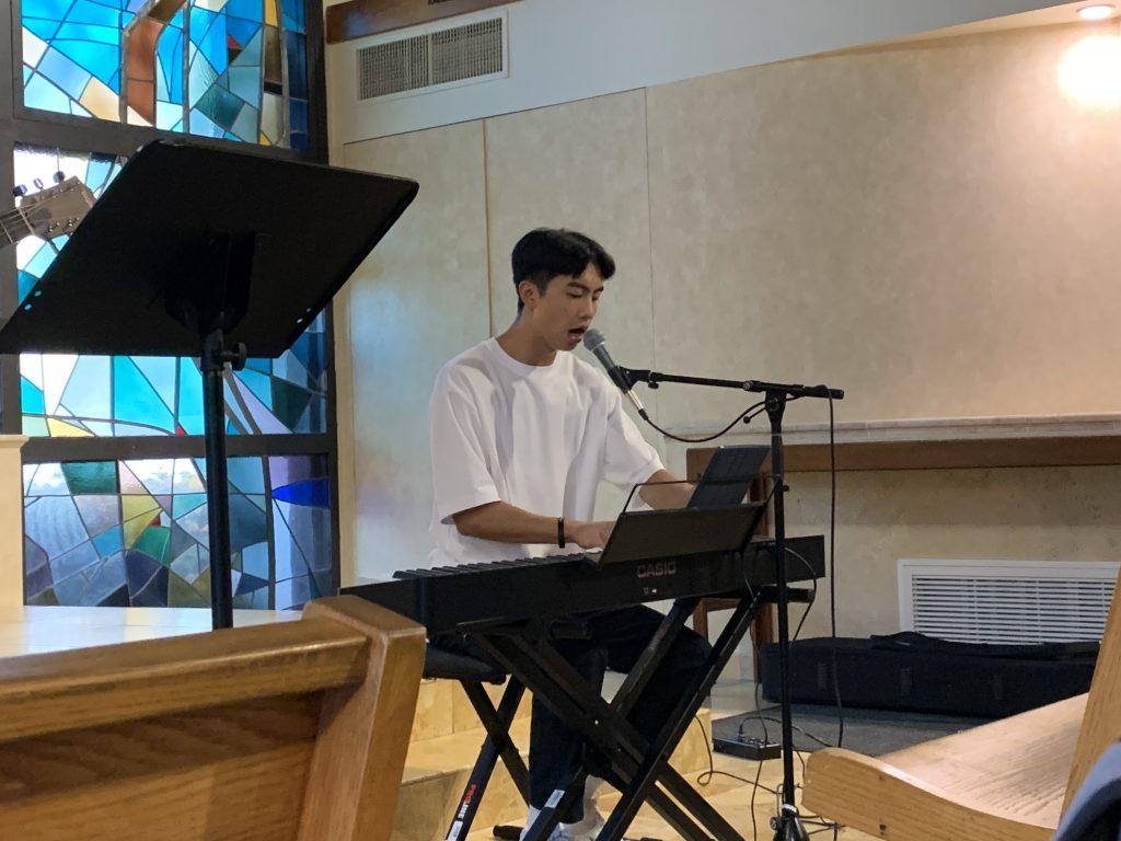 Junior Jonathan Louie plays the keyboard at Stauffer Chapel, Oct. 12. Louie said growing up, he listened to a lot of worship music. Photo courtesy of Jonathan Louie