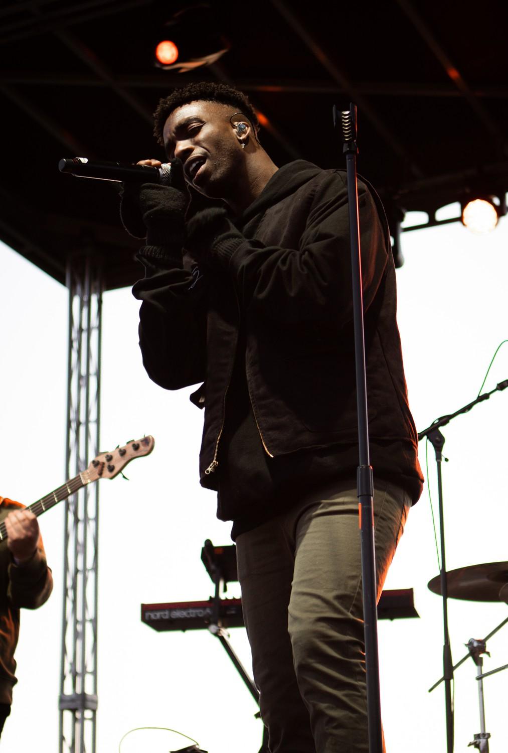 Jayo performs on Alumni Park at PSMA on March 25. Jayo tossed out custom T-shirts with the words, "Chronically Single," on the front. Photo by Sammie Wuensch