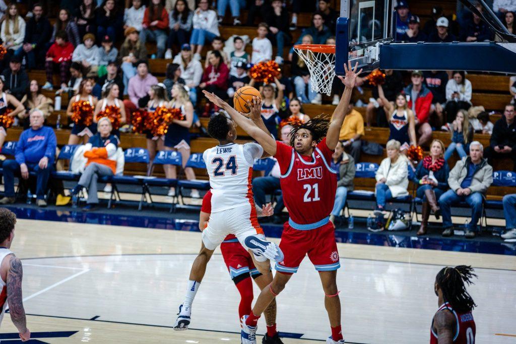 Sophomore forward Maxwell Lewis goes for a heavily contested layup versus LMU on Feb. 23, at Firestone Fieldhouse.