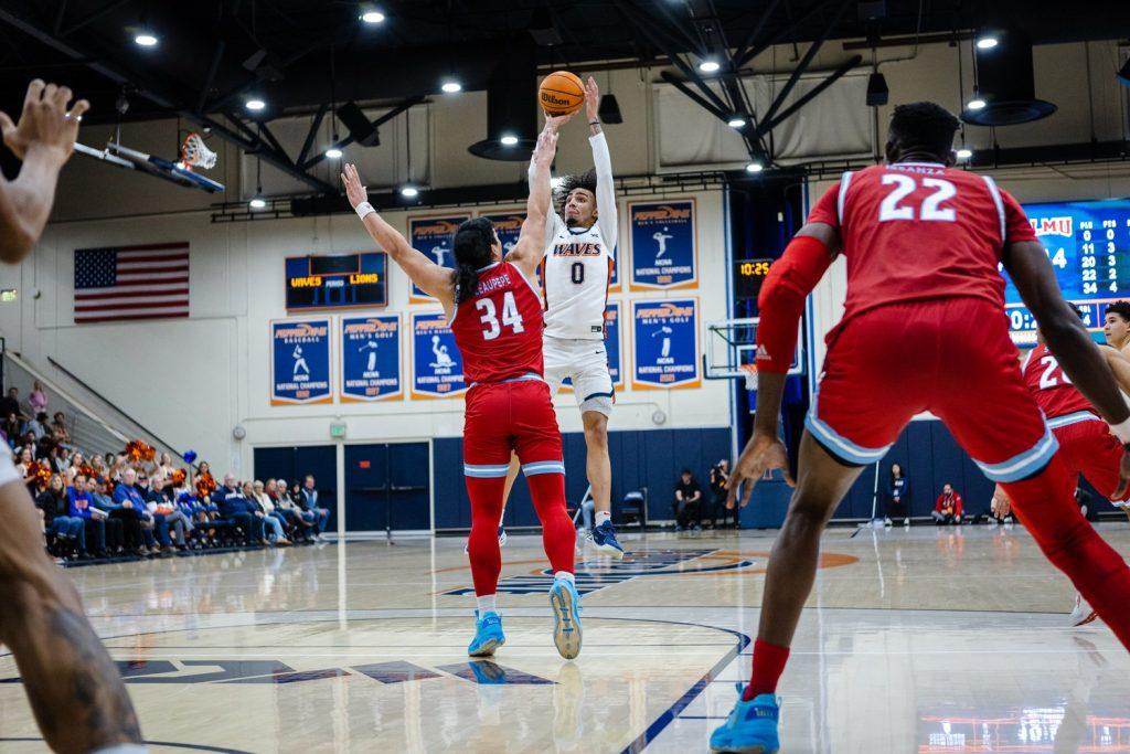 Pepperdine Men's Basketball guard Houston Mallette shoots a jumper versus LMU on Feb. 23, at Firestone Fieldhouse. Mallette was limited to four points on the night.