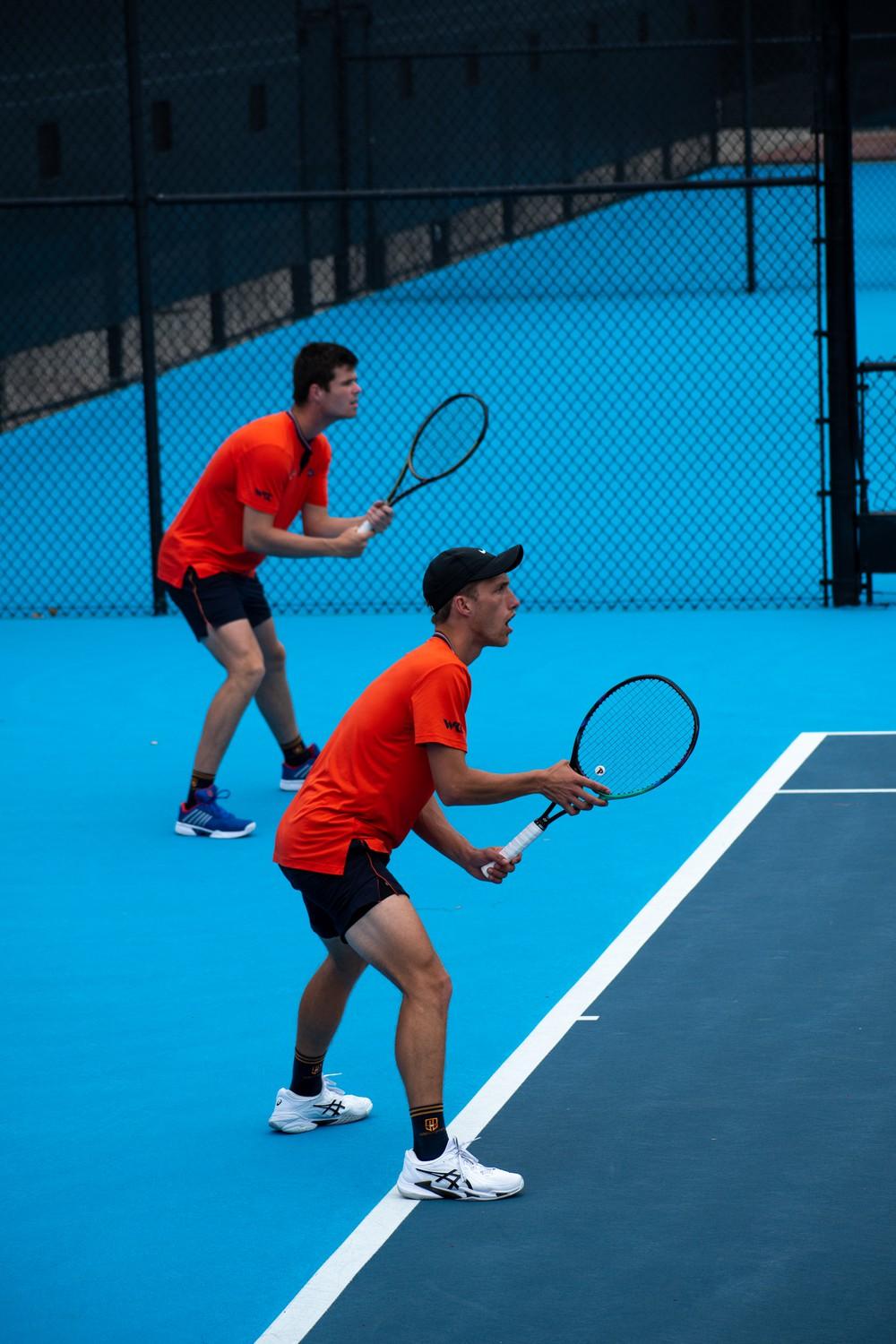 De Jonge and Zeitvogel prepare for the serve March 11, at Ralphs-Straus Tennis Pavilion. Pepperdine lost their share of double matches 2-1.
