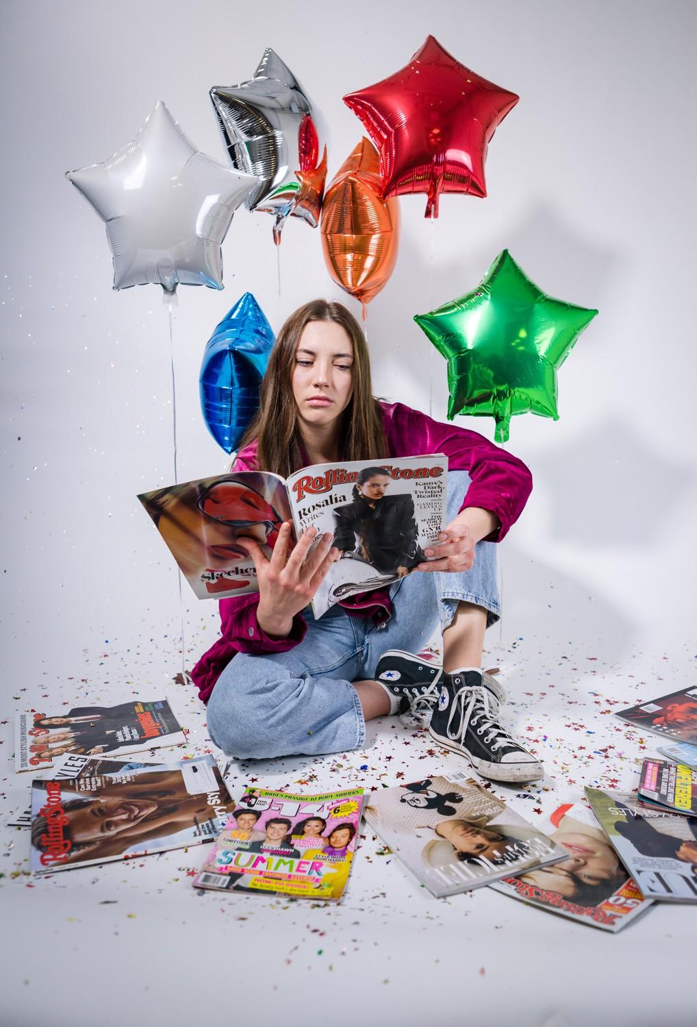 Wishard reads her Rolling Stones magazine.