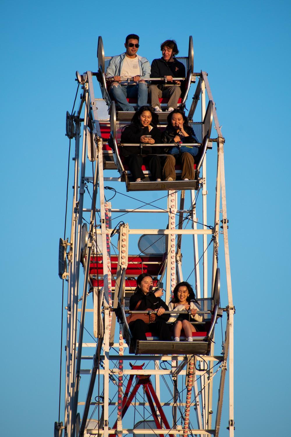 Students ride the ferris wheel on Alumni Park for PSMA on March 25. Over 450 community members attended PSMA. Photo by Brandon Rubsamen