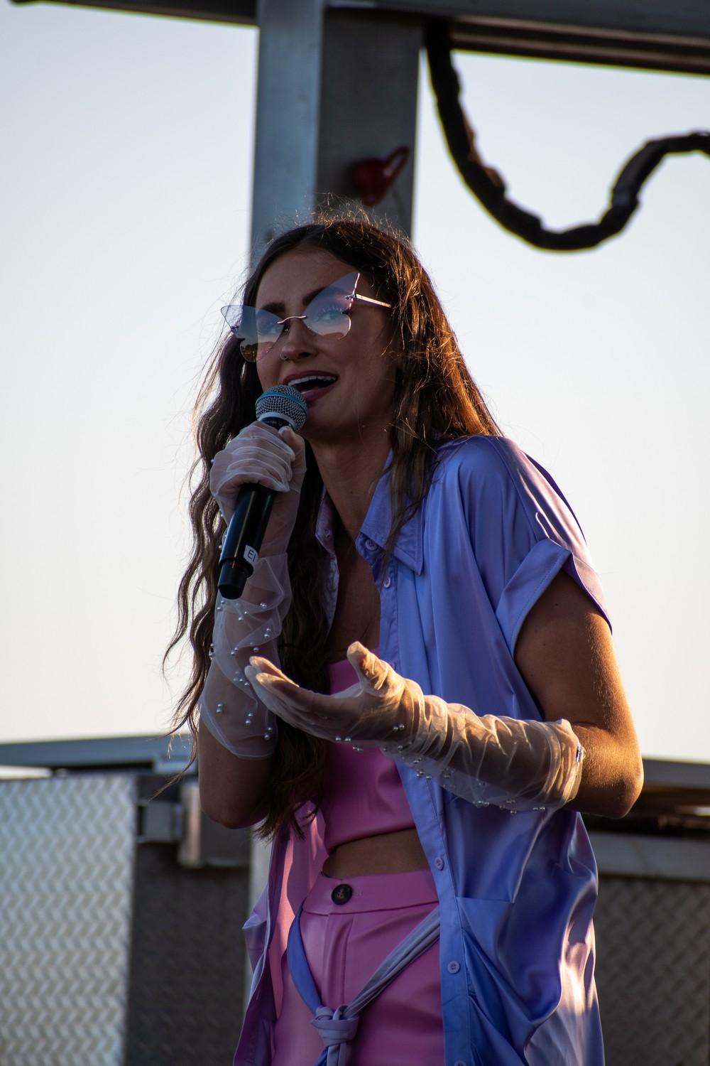 Ellee Duke sings to the crowd at PSMA on March 25. She opened the night with original songs. Photo by Brandon Rubsamen