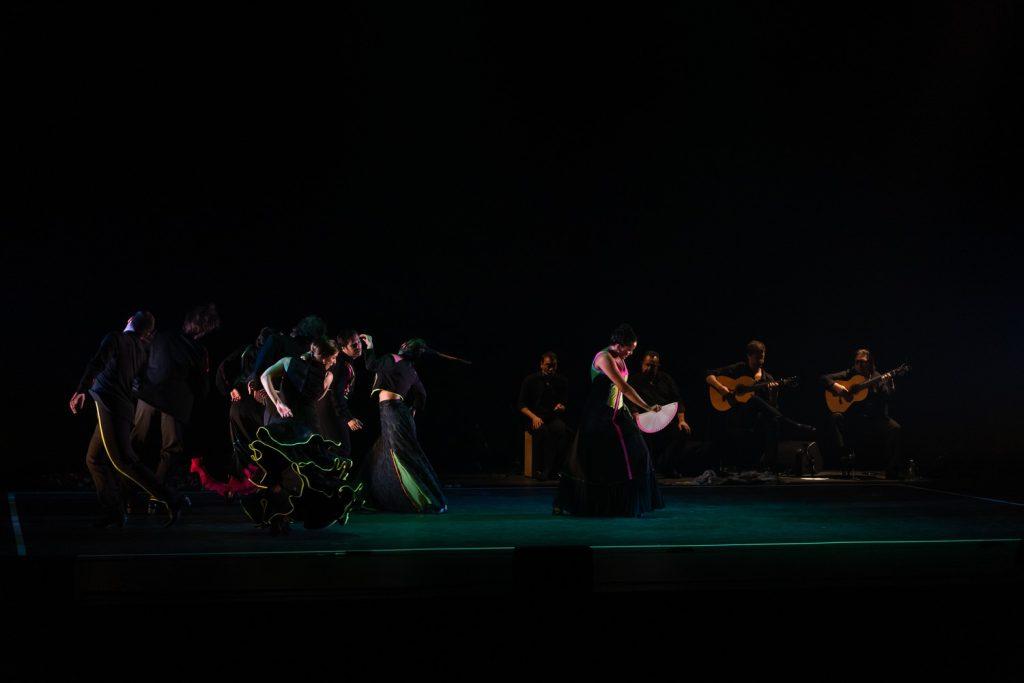 The flamenco troupe sways in unison on Smothers' dim-lit stage as accompanying musicians play guitars and percussion instruments March 21. The company received outstanding acclaim from the crowd after their first performance at Pepperdine.