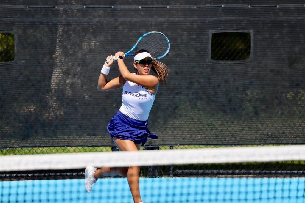 Graduate Student Thumchaiwat returns a serve against Oklahoma at the Ralphs-Straus Tennis Center on March 24. As a team, No. 40 Thamchaiwat and Zaar defeated No. 17 Pisareva and Sleeth in their doubles match. Thamchaiwat also prevailed in singles with a 6-1, 2-6, 6-2 win, according to Pepperdine Athletics. Photo by Pepperdine Athletics