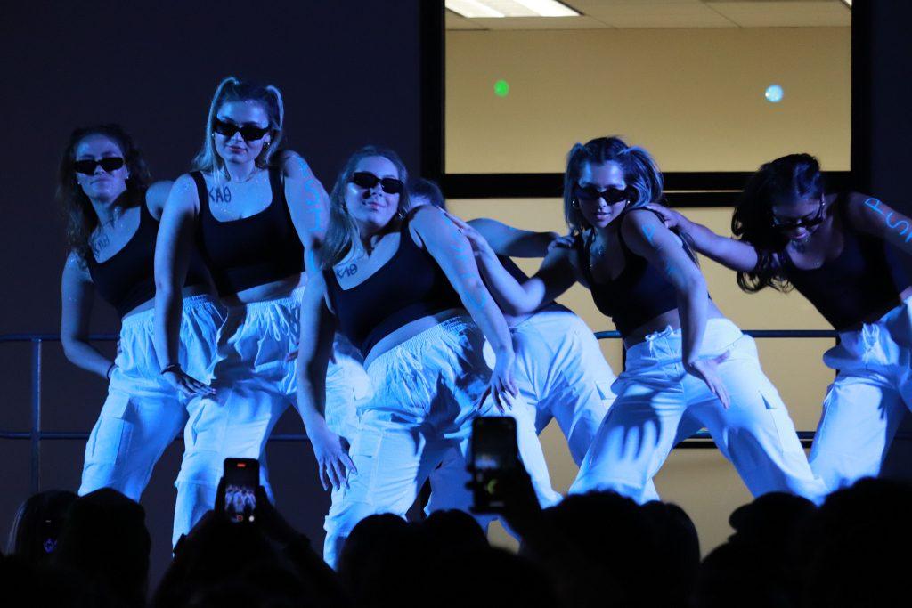 Members of Kappa Alpha Theta dance during their group routine March 31, at the Caf. They won for most points raised.