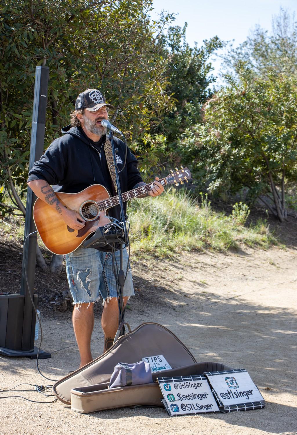 Welker sings and plays for the Malibu Farmers Market at Legacy Park on Feb. 12. Weekly singer Ingrid Yael will remain the lead for performers and said she loves getting outside and seeing all the dogs every Sunday morning.