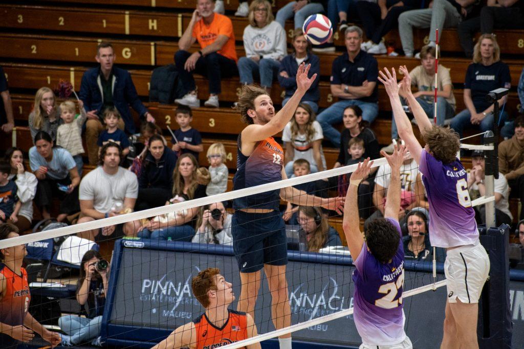 Redshirt junior opposite Jacob Steel challenges Cal Lutheran freshman right side hitter Connor Crawford and junior right side hitter Noah Rigo at the net April 1, at Firestone Fieldhouse. The Waves bounced back after two tough losses versus BYU.