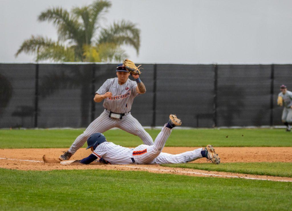 Infielder John Peck dives into third base during a game against Cal State Fullerton at Eddy D. Field Stadium in a game during the 2023 Spring season. Senior pitcher Brandon Llewellyn said Peck was an inspiring figure for the Waves during his time at Pepperdine.