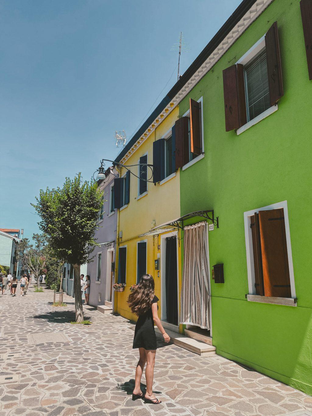 D'Andrea admires the colorful buildings of Burano, an island off of Venice, Italy on June 25. The Vaporetto system, Venice's public waterbus, offered frequent rides to the 118 islands.