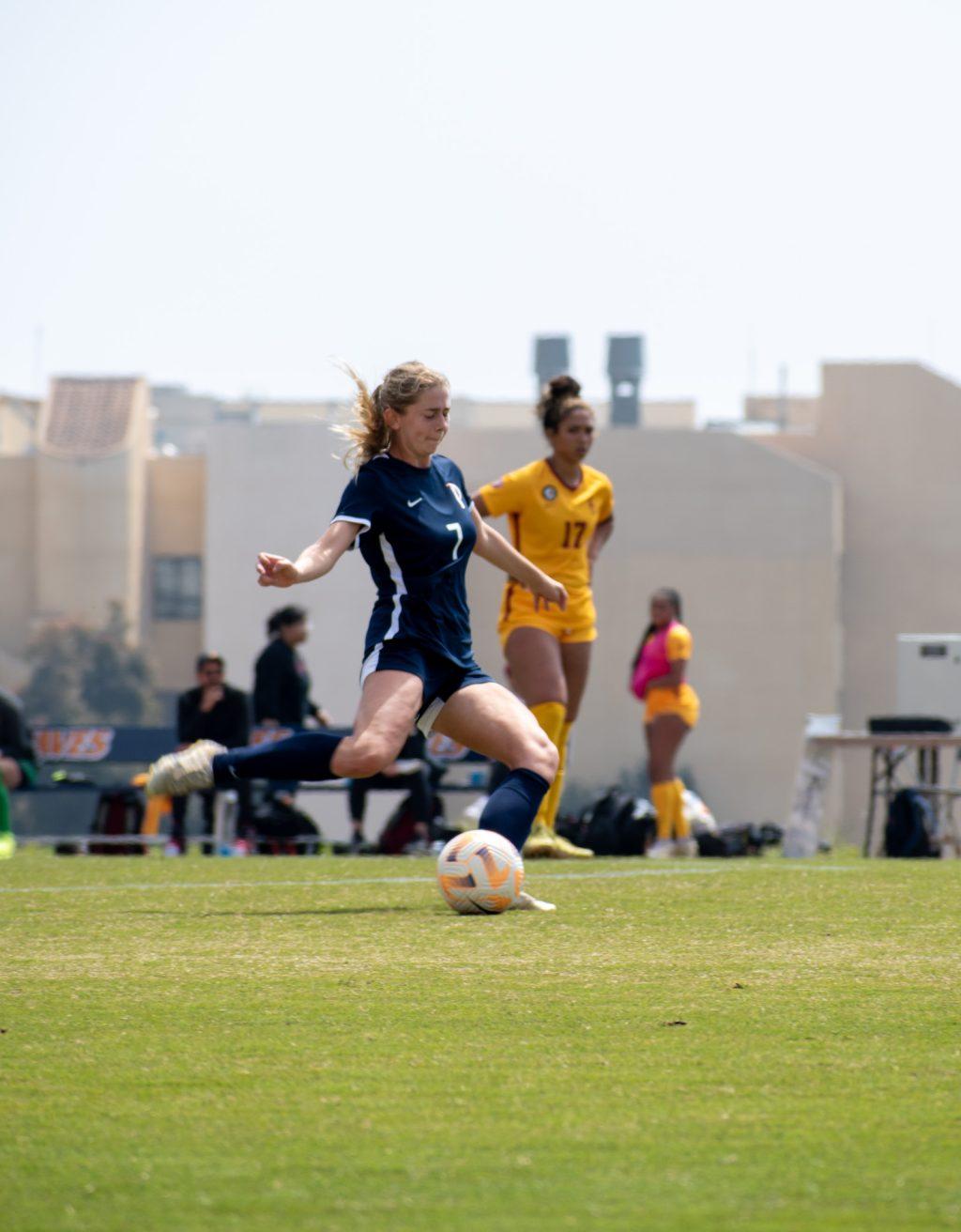 Senior defender Victoria Romero attempts a pass April 2, at Tari Frahm Rokus Field. Romero had 4 assists and 6 shots on goal last year.