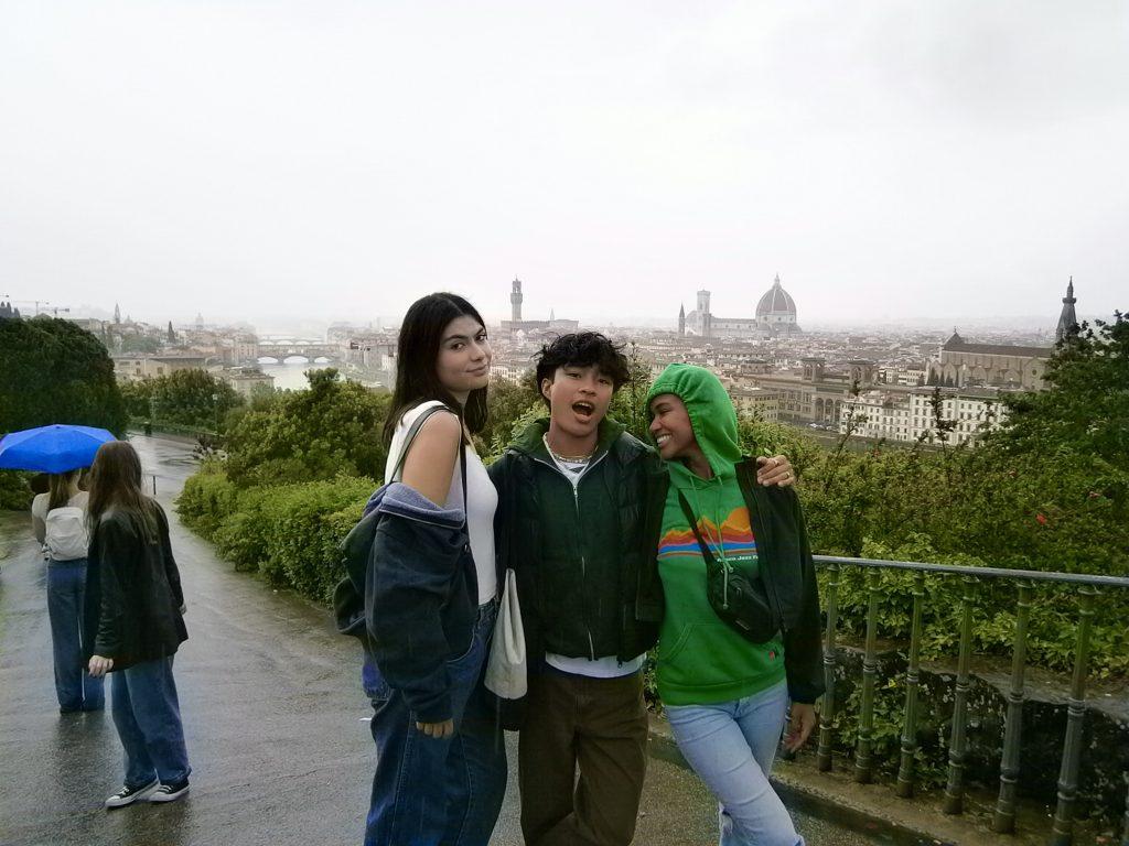 Senior Emma Ibarra (left) and juniors Amiel Silbol (middle) and Jordan Paran (right) pose in front of Florence's famous skyline that features the Duomo cathedral. The Cathedral of Santa Maria del Fiore was built from 1296 to 1436 and has remained a popular tourist attraction.