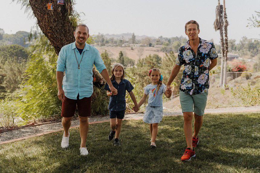 Bryan Keene, their partner Mark Keene, and their two daughters posing for a family photo shoot in 2022. Keene, after coming out publicly at Pepperdine, has been very open about their pronouns and their family. Photo courtesy of Bryan Keene