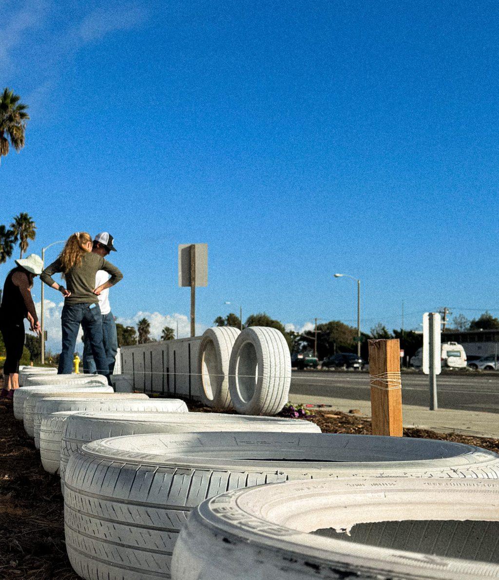 A row of white tires sit at the intersection of PCH and Stuart Ranch Road on Nov. 18. Ghost tires represent lives lost due to traffic violence Damian said.