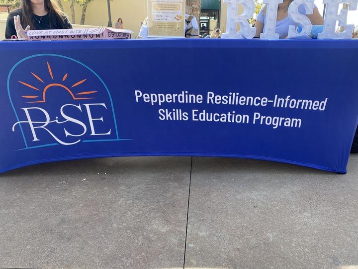 Pepperdine’s RISE Program provides students with information in Mullin Town Square. The RISE Program is active in both Malibu and abroad campuses. Photo by Emma Martinez