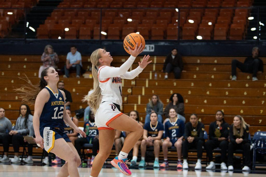 Junior guard Addi Malone goes for a layup against UC Irvine on Nov. 7 at Firestone Fieldhouse. Pepperdine scored 30 points in the paint to Irvine's 25.